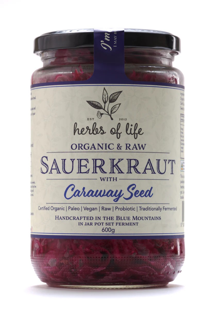 Jar of Herbs of Life Red Cabbage Sauerkraut with Caraway Seed on a white background<br />

