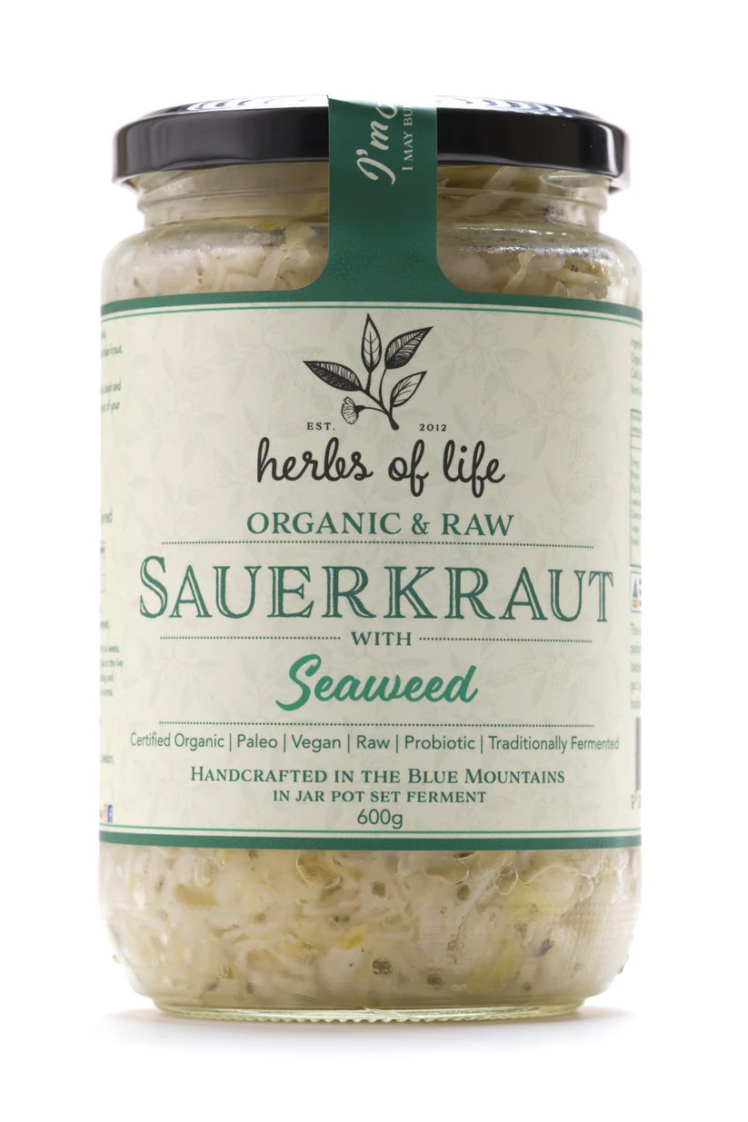 Jar of Herbs of Life Green Cabbage Sauerkraut on a white background